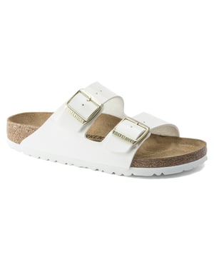 The BIRKENSTOCK Arizona is a genuine classic. Here, the versatile Birko-Flor® material comes in a clean-cut, minimalist look. The patent coating brings the vivid colors to life in an especially expressive manner. Elegant and sophisticated without compromising the sandal&rsquo;s comfort, flexibility and durability. Anatomically shaped cork-latex footbedUpper: Birko-Flor® patentLining: patent leatherSole: EVADetails: strap with two individually adjustable metal pin bucklesMade in Germany
&nbsp;
&nbsp;
&nbsp;