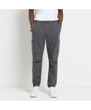 Regular fit, Washed black, Multi pocketing, Elasticated waist, Cuffed bottoms, Our model wears a UK M and is 185.5cm/6'1'' tall, Cotton for this product has been responsibly sourced