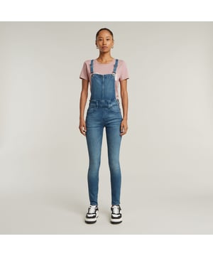 Zipper closure at the side. Adjustable straps. Inset pockets with a coin pocket. Back pockets. Zip closure. High waist. Dungaree Lynn is cut in a skinny fit and offers a high waist silhouette. The design shows a classic 5-pocket construction and a zip side closure for an easy access. Adjustable shoulder straps with suspender buckles ensure a precise fit. 92% Cotton, 6% Elastomultiester, 2% Elastane. Super stretch. Denim, weight 10.47 oz. Super Slim