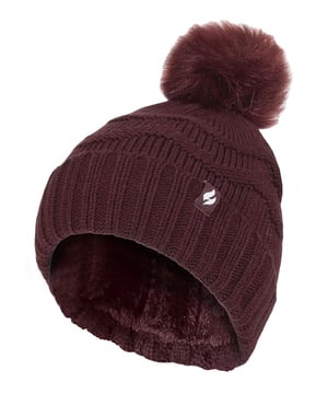 It's cold outside, but don't worry: we've got you covered. These Heat Holders Ladies Pom Pom Hats with Zig Zag knit patterns are the warmest winter hat you'll ever find. A hat that will be sure to keep out the cold! The high performance thermal yarn maximises warm air close to your body, and the Heatweaver technology makes sure that it stays there. So, even when it's freezing outside, you can be sure that this hat will keep your head nice and toasty. The Zig Zag knit design of this beanie is fun and comfortable while the pom pom adds a cute touch that makes this hat look even more fashionable than it already is! It comes in 4 traditional colours: Black, Wine, Navy & Cream. The thick and warm design is soft and comfortable, so you can wear it all day long without feeling any discomfort. Whether you're looking to feel comfortable or fabulous, this Zig Zag beanie hat is an essential addition to your Winter collection! These fashionable hats are made from: Outer: 100% Acrylic, Lining: 100% Polyester and are Ladies One Size fits all. They come in 4 traditional colours: Black, Wine, Navy & Cream and are Machine Washable.