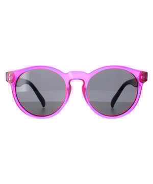Smarty Round Kids Transparent Pink Black Grey X2944  Sunglasses Brighten your child's look with SMARTY Designer Sunglasses model X2944E, perfect for kids aged 3 to 7 years old. These round-shaped sunglasses feature a playful pink frame with durable plastic arms and grey lenses, providing superior UV protection and a fun, stylish appearance. The X2944E model combines trendy design with kid-friendly comfort and durability, making them ideal for any sunny day adventure. Available at an unbeatable discount from the regular retail price, these designer sunglasses offer exceptional quality and value. Give your child the perfect blend of style and protection with SMARTY sunglasses.