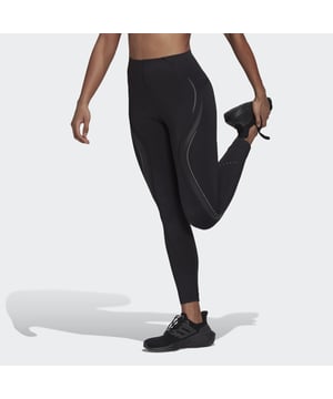 Now, you're ready to raise your heart rate. HIIT to spin to cardio day at the gym, these adidas training tights give you a held-in feel and breathable comfort. Feel confident and supported with a slick fabric. The bonded, flat waistband flexes with you to stay in place no matter how hard you push your limits. Laser perforations where you need them most add extra ventilation, and AEROREADY keeps you feeling dry. A tailored design frames your shape to create a flattering look.Made with a series of recycled materials, and at least 60% recycled content, this product represents just one of adidas' solutions to help end plastic waste.  -