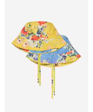 Australian label Zimmermann redefine the strategy of fashion by exploring their own identity that is neither trend-driven nor futuristic. This yellow floral reversible bucket hat captures that brand integrity. Crafted with one side featuring an all-over floral print design and branded tab on the seam. The other side is a gorgeous shade of blue with all over floral print. It is complete with a scalloped edge trim. Pure Cotton Reversible Design Drawstring Fastening One Size 100% Cotton