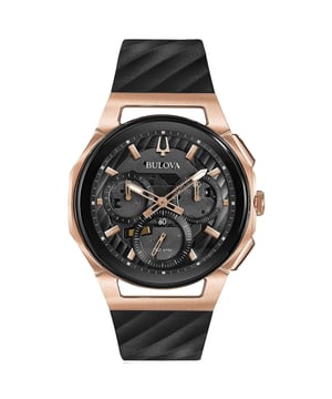 This Bulova Curv Chronograph Watch for Men is the perfect timepiece to wear or to gift. It's Rose Gold 41 mm Round case combined with the comfortable Black Rubber watch band will ensure you enjoy this stunning timepiece without any compromise. Operated by a high quality Quartz movement and water resistant to 3 bars, your watch will keep ticking. This classic chronograph watch gives a comfortable feeling with its leather strap, and its anti-reflective curved sapphire glass is perfect for every occasion -The watch has a function: Five-hand chronograph, Luminous Hand High quality 21 cm length, 20 mm wide Black Rubber strap with a Buckle Case diameter: 41 mm, Case height: 11 mm and Case color: Ip-rosé Dial color: Black