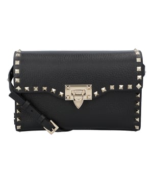 Simple in size and shape, this Rockstud small crossbody bag from Valentino will never go out of style. Made from grainy calfskin leather, it boasts platinum-finish studs and hardware, hook closure, an adjustable strap, cotton lining, and a flat open pocket. - Bag measures approximately 22.5cm x 15cm x 6cm.