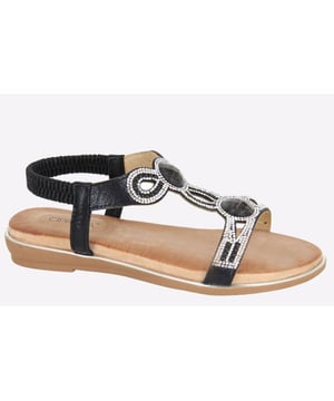 Slip into dazzling style with these Cipriata Desia women's sandals, boasting a sleek black design, with jewelled detailing, and a comfortable microfibre footbed for added comfort.
- PU/Jewel upper- Elasticated back for easy slip-on wear
- Microfibre sockliner
- Jewelled design for visual appeal
- TPR Sole