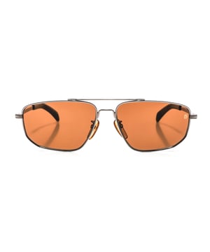 7049GS Metal Frame Sunglasses

 Shape and design:
 - These David Beckham glasses have a rectangular silhouette.

 Frame material:
 - The frame of these glasses is made of metal.
 - The use of metal provides durability and lightness to the frame.
 - This makes the glasses durable and comfortable to wear.

 Metal temples:
 - The temples are also made of metal, matching the frame material.
 - The metal on the temples adds solidity and stability to the structure of the glasses.

 Brand details:
 - DB brand engraving on the lens.
 - These design elements help to clearly identify the model as part of the David Beckham eyewear collection.

 Glasses:
 - The lenses are of high quality.
 - These lenses provide excellent UV protection and sharp, clear vision.
 Measures: Lens height: 40 mm. Lens width: 59 mm. Bridge: 15 mm. Temples: 145 mm.
 Composition: Metal
 Care:
Use a soft, clean microfiber cloth to clean your sunglasses. This type of cloth will not scratch the lenses.
 Avoid using abrasive cleaning products, detergents, alcohol or acetone, as they can damage lenses and anti-reflective treatments.