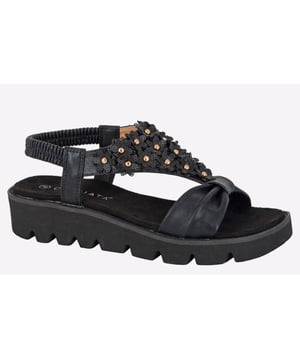 Stand out with these high fashion sandals from Cipriata, featuring a durable wedge heel for on trend style and stability, and micro fibre sock and lining for added comfort. Finishing these stunning sandals are a collection of embellished flowers for a unique look bound to turn heads.
 - PU upper 
 - Elasticated sling back design 
 - PU lining 
 - Micro fibre sock 
 - EVA sole