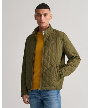 Crafted in a diamond quilting structure, this Quilted Windcheater Jacket features recycled polyester padding and is treated with a water-repellent finish. Design details include a one-way zipper at the front, snap buttons at the collar, slanted welt side pockets and an elasticated hem and cuff with a press button adjuster.
Regular fit  Above hip length  Diamond quilting  Water-repellent
&nbsp;
Shell - Polyester 100%Lining - Polyester 100%Padding - Recycled Polyester 100%
&nbsp;
7006340
&nbsp;