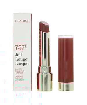Clarins Joli Rouge Lacquer Lipstick is a luxurious and vibrant lipstick that offers a unique combination of intense colour, high shine, and long-lasting wear. This lipstick is designed to provide your lips with a bold and glossy look while nourishing them for a comfortable and alluring finish. This lipstick boasts rich and vibrant colour that delivers a bold and eye-catching result. The standout feature of this lipstick is its high-gloss finish. It imparts a brilliant shine to your lips, giving them a lustrous and radiant appearance. The Joli Rouge Lacquer Lipstick is designed for long-lasting wear, ensuring your lips remain beautifully coloured and glossy for hours without the need for frequent touch-ups. Despite its intense shine, the lipstick has a lightweight and comfortable texture that glides on smoothly. It creates a cushiony and hydrating feel on your lips. Clarins often incorporates moisturising ingredients into its makeup products, and this lipstick is no exception. It contains hydrating components that help prevent your lips from feeling dry or chapped. The Clarins Joli Rouge Lacquer Lipstick is often dermatologist-tested, ensuring its safety and effectiveness for various skin types.