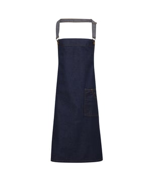 100% Katoen. Stof: Denim. Lengte: 86cm. Breedte: 72cm. Zakken: Patch, Voorzak, Grote zak, Tabletzak. Sluiting: Halsband achter, Band in taille. Slabbetje, Doekhaak, Onderhoudsvriendelijk, Metalen oogjes, Geklonken, Stiksel detail. Stoftechnologie: Duurzaam. Ontwerp: Contrasterende details. 350gsm. Acrylcoating. Duurzaamheid: Amfori, BSCI, Oeko-Tex Standard 100 Gecertificeerd, REACH, Sedex, WRAP Gecertificeerd. Afwerking: Gewaxte look.