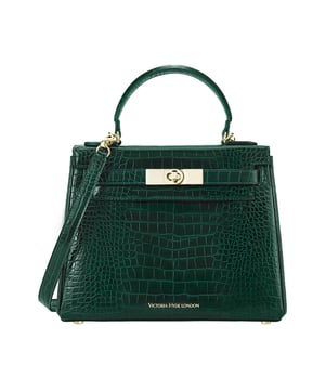 Victoria Hyde, women's bag, work bag, New Work, Victoria, shoulder bag
This new version of the Victoria handbag in brown is made of high-quality material and combines luxurious details such as the gold-colored clasp and subtle branding with a modern, minimalist design. The top handle and adjustable shoulder strap offer flexible carrying options so that the bag can be carried in style both in everyday life and after work. The interior impresses with well thought-out compartments that offer enough space for everyday items such as small books or tablets. Golden fittings perfectly round off the elegant design of this new version and make it an ideal companion for any occasion.
Details:
Dimensions: L28.5cm*H22.5cm*D12cm
Material: Fabric：PU, Lining：Microfiber
Metal color: light gold
Inner structure: Inside of the front of the bag: 1 zipper pocket made of organza.