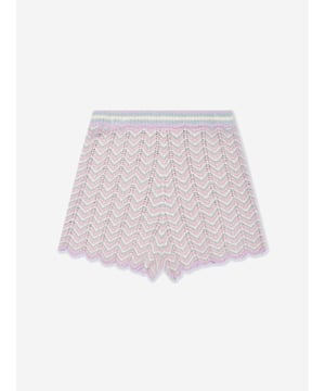 Wrap your little one in a splash of colour for AW2024 with the Zimmermann Girls Halliday Textured Knit Shorts in Multicoloured. These chic shorts are perfect for her playful days and stylish outings. Highlights include: Vibrant Multicoloured Design: Catch every eye with bold, playful hues perfect for any fun occasion. Premium Textured Knit: Ensures both elegance and durability, blending exquisite craftsmanship with comfort. Versatile Style: Easily pairs with tees or sweaters for a seamless transition from summer to autumn.Let her lead the style parade with these must-have Zimmermann shorts!