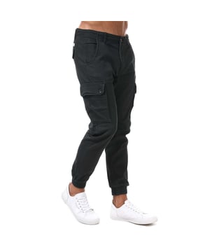 Pantalones cargo ajustados para hombre Jack Jones Paul Warner en negro. - Cierre de botón. - Bolsillos laterales. - Bolsillos con botón en la parte trasera y en las piernas. - Lavado enzimático ecológico que proporciona un aspecto desgastado. - Prenda de tejido de sarga con elasticidad. - Marca en la parte trasera. - Puños acanalados. - Ajuste entallado. - Material principal: 98% algodón 2% elastano. Lavable a máquina. - Ref: 12167596
