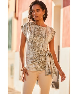 An outfit-transforming t-shirt
Crafted from soft and comfy jersey fabric
Statement tie side detail cinches your waist
Snake print makes so luxe
Figure-hugging fit
It's made for skinnies, leggings and tapered trousers