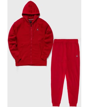 Nike Jordan Essential Fleece trainingspak, jouw nieuwe dagelijkse essential. De veelzijdige fleecestof is ideaal voor het herfstseizoen en vormt de perfecte achtergrond voor het Jumpman-embleem en het kenmerkende borduurwerk op de hoodie en joggingbroek. Hoodie en joggingbroek met elastisch trekkoord. Zware fleecestof is aan de binnenkant geborsteld voor extra zachtheid. Stretch geribde manchetten en zoom. Jordan standaard pasvorm.