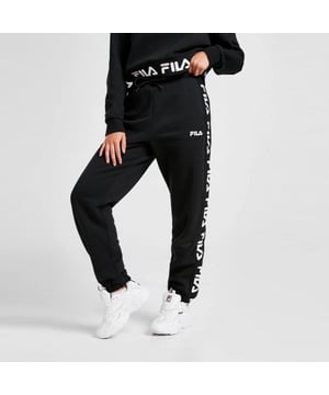 Fila Womens Jacquard Panel Joggers in a Black. 
These Soft Pants have a Luxe Feel to Them While Offering Ultra Comfort. 
These Joggers Have Elasticated Cuffs with Waistband for a Perfect Fit. 
Finished With a White and Black Fila Taping Down Both Legs and a Fila Logo to the Thigh. 
80% Cotton, 20% Polyester. 
Machine Washable.