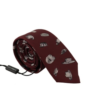 <ul>
  <li>Corbata 100% autentica de Dolce & Gabbana</li>
  <li>Color granate</li>
  <li>Modelo: Atado</li>
  <li>Material: 100% seda</li>
  <li>Correa para el cuello de longitud ajustable talla unica</li>
  <li>Fabricado en Italia</li>
  <li>Ancho: 6cm</li>
</ul>
