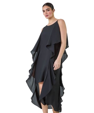Plain Dipped Hem Ruffle Detail Midi Dress from Roman. Elevate your Summer wardrobe with this striking ruffle detail midi dress from the Ariella range. Featuring a elegant, cascading waterfall ruffle detail, this dress has a striking hi-low silhouette to add a touch of drama to your occasionwear. This sleeveless dress with a concealed back zip fastening is crafted from plain woven fabric and fully lined for maximum comfort. The metal trim on the shoulder straps provides a sophisticated edge. Whether you're attending a wedding or a formal dinner, style it with strappy heels and a clutch bag for event-ready glamour!