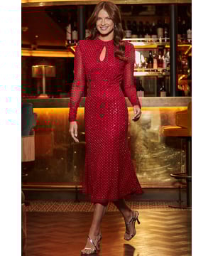 That silhouette is so chic Scattered with a sparkling embellishment Elevated with a sexy keyhole neckline Tight fitted long sleevesFitted waist falls to a swishy midi hem Pair with strappies and a clutch for en elegant occasion look