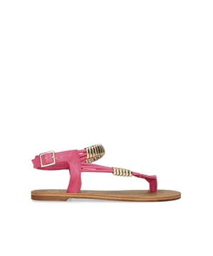 The Klipper sandal features a fuchsia upper with silver tone rings across the straps. The ankle is fastened with silver tone buckle.