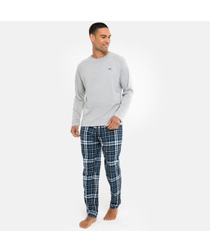 Lounge in comfort with this cotton rich pyjama set from Threadbare. This set contains a long sleeve top with raglan sleeves and Threadbare embroidery on the chest, and long flannel check pants with an elasticated waistband and branded drawcords. Perfect for lounging at home or bedtime.
