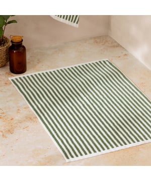 Elevate your bathroom with the Hebden Striped Cotton Bath Mat, crafted from 100% cotton terry for an irresistibly soft feel underfoot. Combining a timeless striped design with versatile contemporary shades, it brings a perfect balance of classic and modern style to your space. Designed to create a cool, calming atmosphere, this bath mat promises more than just style—it enhances your sense of comfort and wellbeing. Durable and naturally breathable, it offers practicality to match its beauty, making it an essential finishing touch to your home environment.