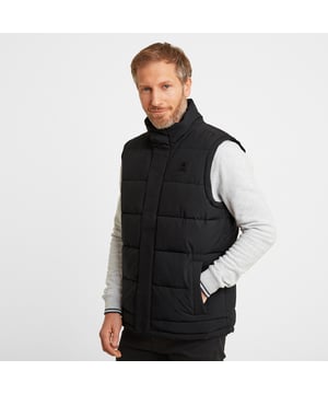 Keep your core warm but still enjoy freedom of movement in our Barmston chunky padded gilet. The high performance quilted body incorporates a layer of thermal filling that will conserve body warmth when the temperature drops. Practical and versatile, Barmston makes a great outerwear piece for a trek across the Yorkshire moors or over a fleece with your favourite jeans for a trip to the pub. This cosy body warmer has a high neck that protects against the wind. It is finished with a concealed front zip that fastens with press studs and Velcro, making it easy to shrug on and off. You'll also find two handy zip pockets for safely storing your wallet and keys - or to use as hand warmers when you forget your gloves. You'll find a rubber Yorkshire Rose badge on the chest as a proud reminder of our Spen Valley heritage.