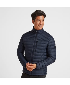 Perfect for adding a layer of warmth without any bulk, our Drax down filled mens jacket feels silky-soft, incredibly light and packs down small into a zip up inside pocket. You'll have no trouble finding room for it in your case when you go away, and it also makes a handy travel pillow. This padded jacket gets its incredible warmth from naturally insulating duck down that traps heat without being bulky. Quilted bands, a panelled cut and a draught-busting high neck mean it feels as good as it looks, and it has thoughtful details like a soft chin cover over the top of the zip. Designed to squish down really small, then spring back into shape, Drax has roomy side pockets protected by an elasticated flap, light elastic at the cuffs and small toggle adjusters at the hem keep the chill out. Designed in Yorkshire, where we always need layers, our Drax mens jacket is ideal for wearing over a top when it's only a bit chilly or layering under a coat when the wind is howling. Reflecting our Spen Valley ethos of Truth Over Glory, it has a TOG24 logo proudly printed on the chest.