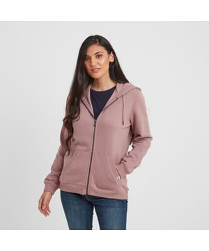 A wardrobe staple, our Mia zip through hoody comes in a supersoft brushed back fleece finish, so soft and cosy that you won't want to take it off. A layer you can easily throw on for a blustery walk across the moors, popping to the gym or meeting up with friends, giving you much needed insulation on chilly days. This classic hoody has a premium feel and keeps its shape for years to come thanks to generous ribbing to the cuffs and hem and the opening of the snug, split kangaroo pocket. The double fabric drawcord hood is warm and cosy and keeps the wind out of your ears. Mia comes in colours inspired by wild moorland heather, celebrating our proud Yorkshire heritage, and is finished with a small branded woven Truth Over Glory label on the pocket.