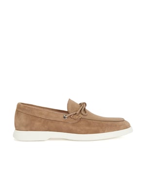 . A slip on shoe with suede uppers featuring decorative tassels across the vamp in brown suede and all over brown stitch details. Two silver branded eyelets situated on the outstep and instep with the signature BOSS logo embossed on the outstep of the heel. A textured rubber midsole in off white with a branded and textured rubber undresole in off white.