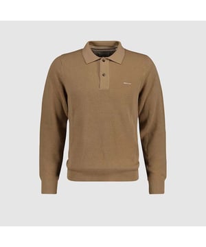 This versatile sweater from GANT is knitted from 100% cotton in a lightweight piqué structure. Designed for a regular fit  it features long sleeves  a polo collar and buttoned placket. This piece is made complete with ribbed detailing at the hem and cuffs  and a GANT logo embroidered at the chest. Wear it with everything from jeans to chinos.  By choosing our cotton products  you’re supporting GANT's investment in Better Cotton’s mission. This product is sourced via a system of mass balance and therefore may not contain Better Cotton. Read more on bettercotton.org-massbalance.Regular fit- Long sleeves- Polo collar and placket- Rib detailing at hem and cuffs- Contrast stripe detail on inside neck- GANT logo embroidered at chest- Wash with similar colors. Wash inside out. Reshape while wet. Iron back into shape.