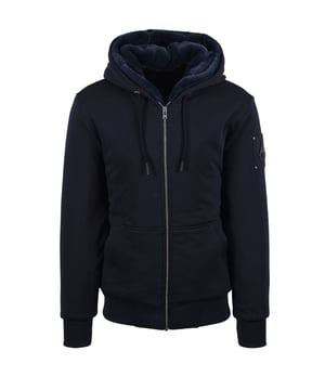 Moose Knuckles Classic Bunny Hooded Full Zip in Navy
Embrace versatile warmth and effortless style with the Moose Knuckles Classic Bunny Hooded Full Zip in sophisticated navy. This isn't just a hoodie; it's a meticulously crafted piece designed to transition seamlessly through changing seasons.
 
Unparalleled Comfort and Adaptable Warmth:
The Classic Bunny masterfully blends the relaxed comfort of a classic hoodie with the added warmth of a lightweight jacket. Experience the luxurious embrace of the removable, high-pile ultra-soft faux fur liner, providing exceptional cosiness when temperatures drop. When milder weather prevails, simply detach the liner for a lighter, more breathable feel.
 
Everyday Protection:
Rated Level 2 for Cold protection, this jacket is your reliable everyday winter workhorse. It's built to withstand rain, sleet, hail, and snow, ensuring you stay comfortable and protected without overheating.
 
Designed for Movement and Style:
The regular fit silhouette offers ample room for movement throughout the chest and arms, allowing for comfortable layering without sacrificing structure. Enjoy the agility you need, whether you're navigating city streets or relaxing at home.
 
 
Features

One-Way Zipper with Logo Puller: Durable and stylish, featuring the iconic Moose Knuckles logo.
Kangaroo Pocket on Front: Convenient storage for essentials and a cosy place for your hands. 
Removable High Pile Ultra Soft Fur on Interior: Customizable warmth for changing conditions.
Gunmetal Metal Logo: A subtle yet distinctive mark of quality.
100% Recycled Polyester Polyfill: Eco-conscious insulation for added warmth.
Body Fabric: 75% Cotton, 25% Polyester for a comfortable and durable feel.
Lining: 100% Polyester for smooth layering.
Style code: M32MS600