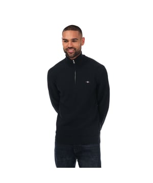 Mens Gant Textured Cotton Half-Zip Sweatshirt in blue.- Ribbed collar.- Half zip fastening.- Ribbed cuffs and hem.- GANT logo embroidered at the chest.- Relaxed fit.- 100% Cotton. - Ref: 8030172433