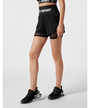 Estos shorts 2 en 1 están diseñados para todas tus sesiones de entrenamiento, desde las más ligeras a las más duras, o incluso para hacer footing sin más. Supera siempre tus límites.   Pantalón corto de licra mate de máximo confort y secado rápido, perneras cortas de tul elástico para equilibrar la temperatura de los músculos.   Tejido jacquard de la marca en la cintura elástica   Cintura de talle alto para un ajuste seguro y mayor firmeza