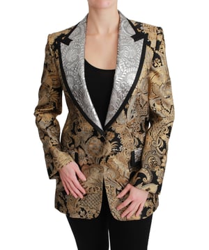 Blazer jacquard floral negro y dorado de Dolce & Gabbana  
Cierre de un botón  
Hecho en Italia  
Solapa plateada  
Forro interior de seda negra elástica  
Detalles del logo  
Material: 30% Nylon 28% Acetato 22% Seda 12% Fibras metálicas  
Forro: 94% Seda 6% Elastano  
Material: 30% Nylon 28% Acetato 22% Seda 12% Fibras metálicas