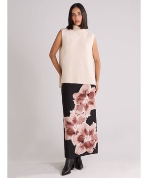 Co-founders' Notes

Our Mono Floral Placement Print Skirt is made from a recycled polyester mix satin back crepe, features a new mono floral design. This fully lined skirt includes a back zip, and a back skirt split for ease of wear. Its long midi length offers a stylish and comfortable fit.

Zip in back

Split in back skirt
Long midi length
True to size. Try your usual size



 Fabric &amp; Care



 Composition:   Main: 51% Recycled Polyester 49% Polyester Lining: 100% Viscose


 Garment Care:  Machine Washable


 Size &amp; Fit


True to size. Try your usual size

 Length: 90cm (size 10) 

Model is 170 cm/5'7" and is wearing a size 10