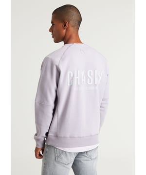 Der Mayor Sweat ist ein loose fit Pullover aus peached Stoff für ein soft feel. Dieser Pullover hat einen großen 3D-Print auf dem Rücken, einen kleinen dezenten Brustprint und kontrastierende Nähte an den Ärmeln.