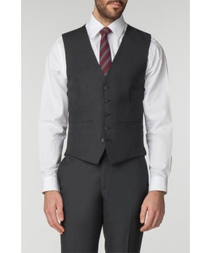 Pick and Pick Waistcoat by Racing Green. The Racing Green Collection is presented with classic understated style and design. The use of classically British heritage that inspires the brand extends through to the cloth, design and typically confident use of colour. This pick and pick suit is made from a Wool blend and is crafted on the Racing Green tailored block to create a sharp and sophisticated silhouette. Wear the jacket, trouser and waistcoat together for the perfect three piece suit.