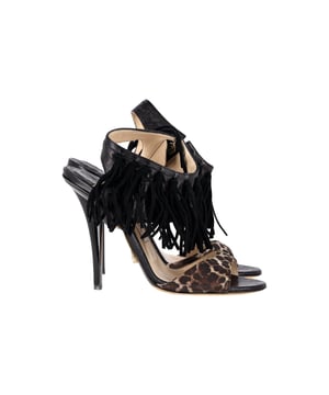 VINTAGE, RRP AS NEW
Add a touch of wild elegance to your footwear collection with the Jimmy Choo Leopard-Print Fringe Sandals. The leopard print is a bold choice that instantly elevates any outfit. The fringed details add a bohemian and eclectic touch, giving these sandals a unique and playful vibe. With an open-toe design and high heels, they are both stylish and flattering.

Jimmy Choo Leopard-Print Fringe Sandals in Black Leather
Condition: Very good with box
Sign of wear: Light wear on the soles and insoles, marks on the heel
Material: Leather
Color: Black
Size: IT36.5 / US6.5 / UK3.5
SKU: 357150 / TONPUGBSH357150W
