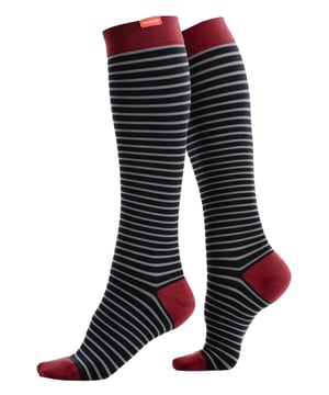 Energize your legs! Using integrally-knit graduated compression, these compression socks apply therapeutic pressure that starts at the ankle and gradually eases above. It’s this external pressure that energizes your legs and reduces swelling. These socks have a 30-40 mmhg compression level that is ideal for all-day, everyday wear, sitting or standing for long periods. High-quality premium nylon fibers and spandex throughout the sock allow for sustained compression throughout the day. Alleviate achiness & heaviness by squeezing the legs from the bottom up, our legwear can help increase circulation of freshly oxygenated blood back to your legs. These are made for people with circulation problems and also ideal for flight travel, pregnancy, exercising, when sitting or standing for long periods of time and even during visits to hospital. These socks are specially designed to energize legs, reduce swelling, alleviate achiness & heaviness and to aid in muscular recovery. The specially designed fabric nylon and the 400-needle count gives supreme comfort and flexibility which contours leg and heel for superior fit. These socks are comfortable and breathable with graduated compression from ankle to calf with a contoured leg and heel for a great fit. The flexible toe pocket doesn’t squeeze the toes! Tested & trusted: based out of missoula, montana, VIM & VIGR is dedicated to creating products that provide you with everyday relief. VIM & VIGR graduated compression legwear was developed in partnership with vascular surgeons and vein clinics and all products are listed with the food and drug administration (fda). These compression socks are available in slate blue/maroon and 3 sizes: Small/Medium, Medium/Large and Large/X-Large. They’re made out of 91% Nylon, 9% Spandex (latex-free) and are machine washable.