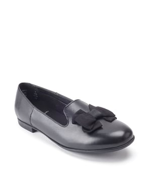 A fashionable school shoe for senior girls, Inspire has a slipper design with an oversized bow for a finishing touch. Made with soft black leather, these shoes are designed to keep feet cool with our Air Rite technology. Allowing air to flow around the shoe without affecting the shoes ability to cope with our changeable weather, Air Rite reduces sweating to help keep feet happy and healthy.