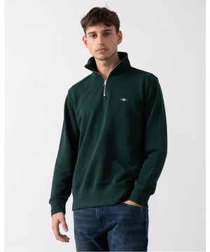 Featuring a small embroidered patch on the chest, this half-zip sweatshirt features soft ribbing at the hem and cuffs to create a fitted silhouette. This hard-wearing cotton-polyester blend is ideal for warming up your outfits for late summer evenings or cool autumn mornings.


Regular fit
Half-zip collar
Ribbed hem and cuffs
GANT graphic embroidered at chest



 87% cotton, 13% polyester 

2008005