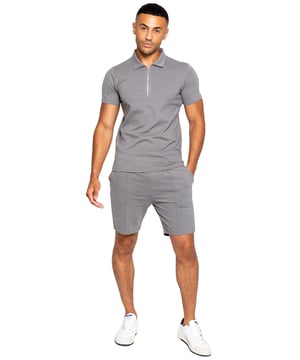 Enzo Mens Collared Polo Tracksuit Set. Collared, ¼ Zip, Short Sleeve Polo. Stitched Trims At Sleeve & Hem. Stretch Fabric For Extra Comfort. Finished with Stretch Shorts. 2 Side Pockets, 2 Back Welt Pockets. Elasticated Waistband With Adjustable Drawstring. Front Pin Tuck Seam