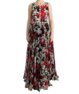 Wunderschönes Dolce & Gabbana Maxikleid mit floralem Muster und goldenen Metalldetails  
Neu mit Etikett, 100% authentisch  
Maxikleid in voller Länge  
Farbe: Schwarz mit mehrfarbigem Blumen- und Sonnenblumenmuster sowie goldenen Metalldetails  
Kristalle: Klar und gelb  
Reißverschluss hinten  
Innenslip aus schwarzer Seide  
Logodetails  
Hergestellt in Italien  
Sehr exklusiv und hohe Handwerkskunst  
Material: 77% Seide, 20% Baumwolle, 3% Viskose  
Futter: 56% Seide, 6% Baumwolle, 4% Elasthan, 32% Nylon