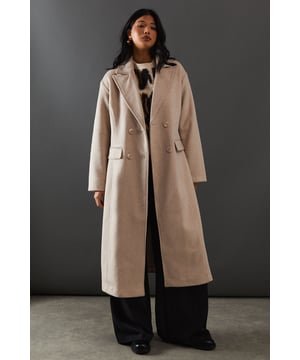 Double-breasted design for a sophisticated silhouette
        Maxi length offering full coverage and dramatic flair
        Wide lapels adding a touch of classic elegance
        Flap pockets for both style and functionality
        Relaxed fit allowing for layering versatility
    
    Make a statement with this striking double-breasted maxi coat from Warehouse. Perfect for the confident woman who appreciates edgy yet feminine style, this coat seamlessly transitions from day to night. The oversized silhouette exudes effortless chic, while the maxi length adds drama to any ensemble. Style it over wide-leg trousers and a chunky knit jumper for a contemporary daytime look. For evening affairs, drape it over a sleek midi dress and pair with heeled boots to create a captivating outfit. The versatile design allows for endless styling possibilities, making it a true wardrobe staple that will serve you well for seasons to come. Whether you're heading to the office or out for dinner, this coat will ensure you arrive in style.