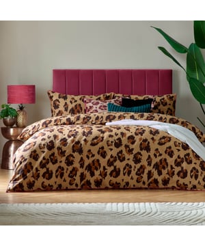 Transform your bedroom into a statement of undeniable style with the True Leopard Printed Duvet Cover Set. Crafted with a cotton blend and a 180-thread count, this bedding promises both comfort and durability. Its bold leopard print pattern adds a touch of wild sophistication, perfect for those looking to refresh their space with a modern and chic look. The piped trim detail on the duvet and pillows adds a tailored finish, elevating the overall aesthetics. Ideal for those who value individuality, this set effortlessly combines practicality and design, creating a centrepiece that doesn’t just look good but feels amazing too.
