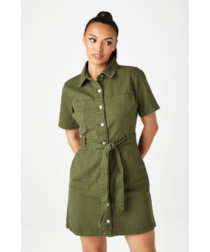 The perfect day out mini dress featuring a flawless fitted silhouette with a button and tie waist fastening. The ideal dress for a night out with friends to a holiday centrepiece, this dress will quickly become your favourite. Model is 5'6 and wears a size 8.