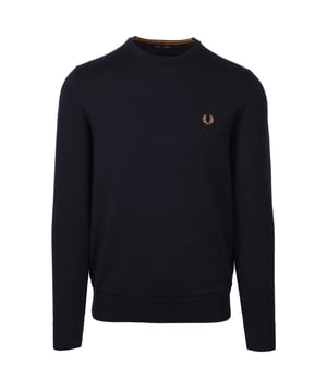 Fred Perry Classic Crew Neck Knitwear&nbsp;Navy
The classic crew neck&nbsp;jumper&nbsp;is crafted with a blend of merino wool and cotton for warmth, durability, and a luxurious feel. Designed&nbsp;with twin tipping inside the neck, this is a smart staple for year-round wear. This Navy colour is nicely complimented with dark caramel tipping and embroidered badge. Effortless to wear with your existing wardrobe.

52% Wool / 48% Cotton
Embroidered Badge
Gentle Machine Wash
Style - K9601