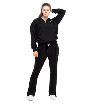 Tom Barron Dames trainingspak met kwart rits en logo in oversize